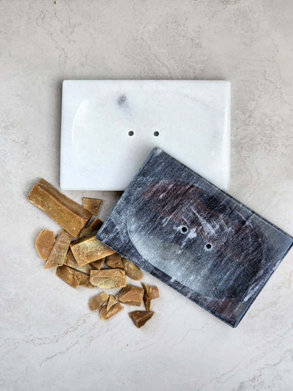 Elegant marble soap dish with natural variations displaying sophistication, ideal for bathroom decor.