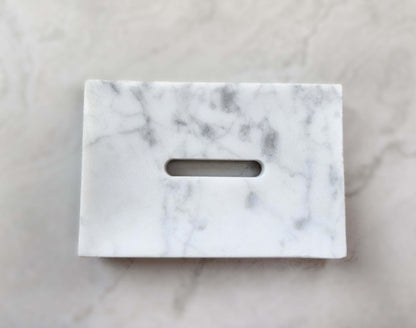 Elegant marble soap dish with natural veining, perfect for adding sophistication to your bathroom decor.