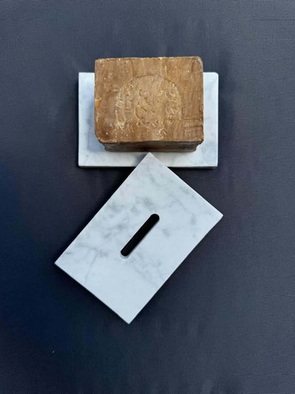 Elegant marble soap dish with soap bar, featuring unique natural patterns, ideal for enhancing bathroom decor.